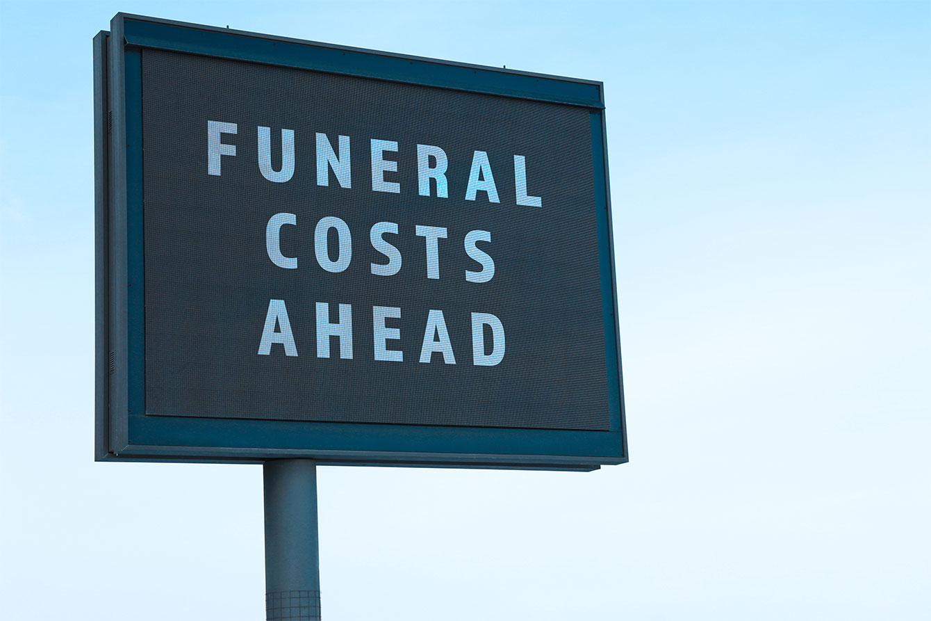 Advertising billboard with text Funeral Costs Ahead