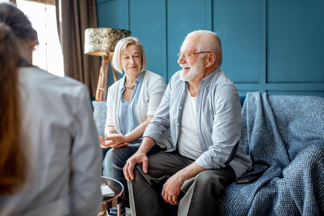 senior couple discussing their care options