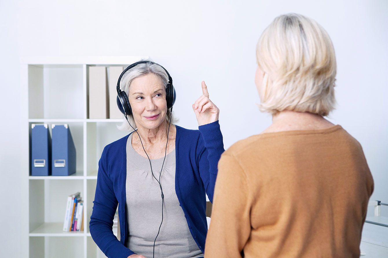 Senior woman undergoing a hearing test