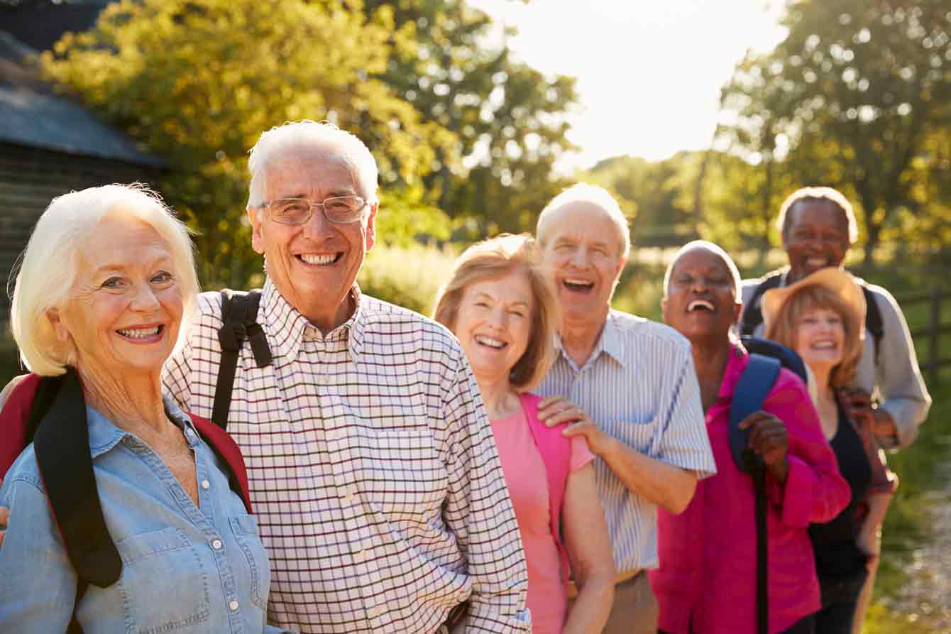 Portrait of senior group on a hike in the country side