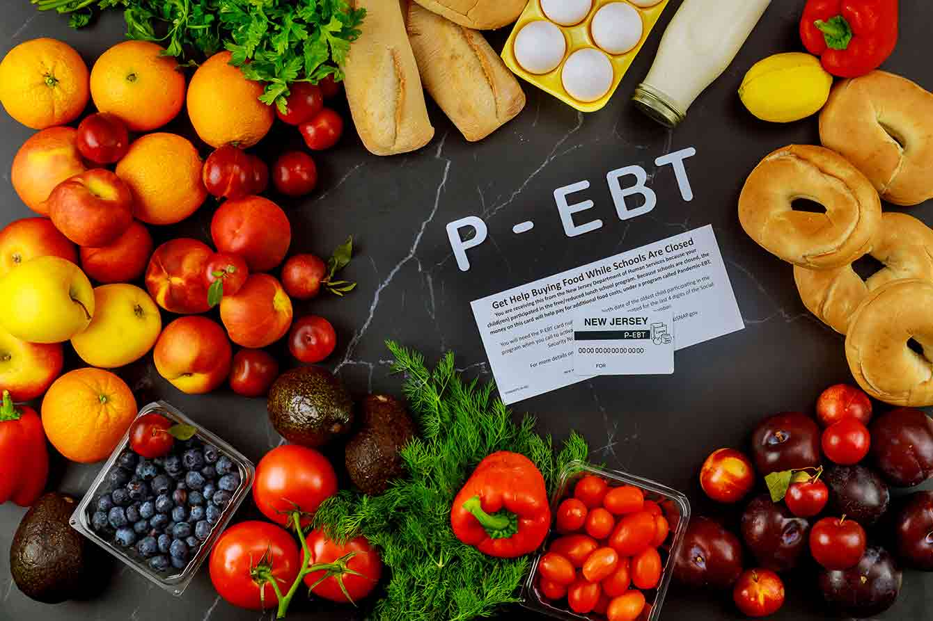 Pandemic EBT card surrounded by purchased food