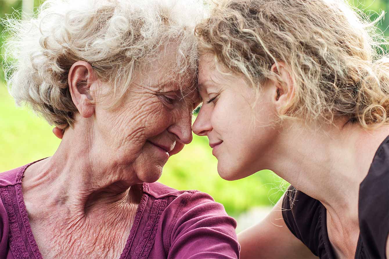 Mature mother and daughter face to face