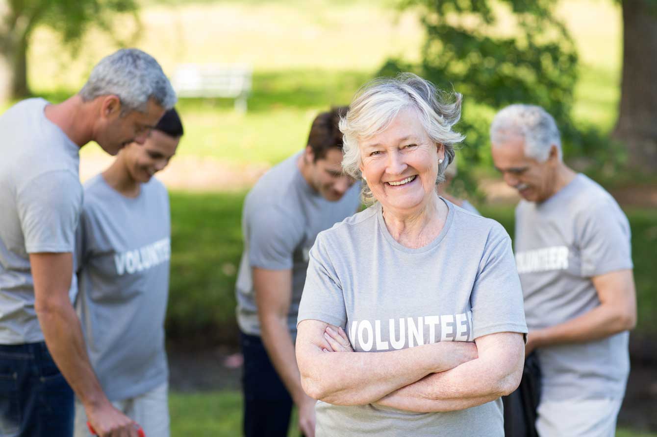 Happy volunteer grandmother smiling