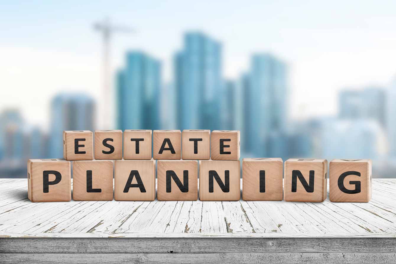 Wooden blocks spell out the words estate planning