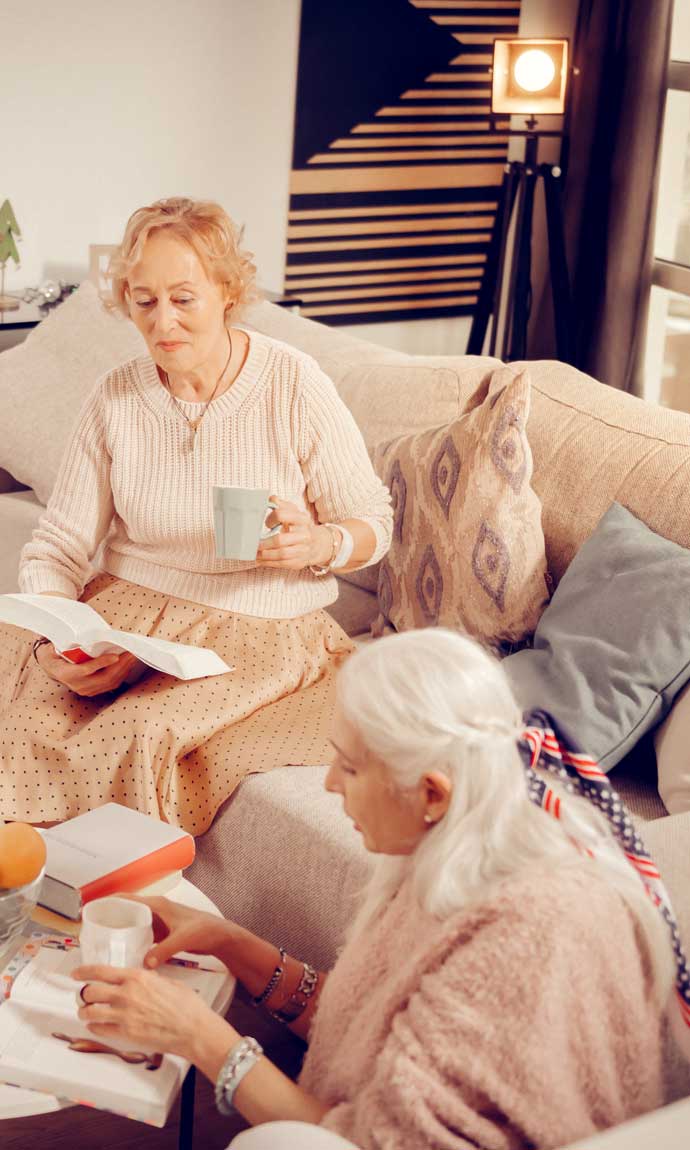 senior ladies hanging out with their book club