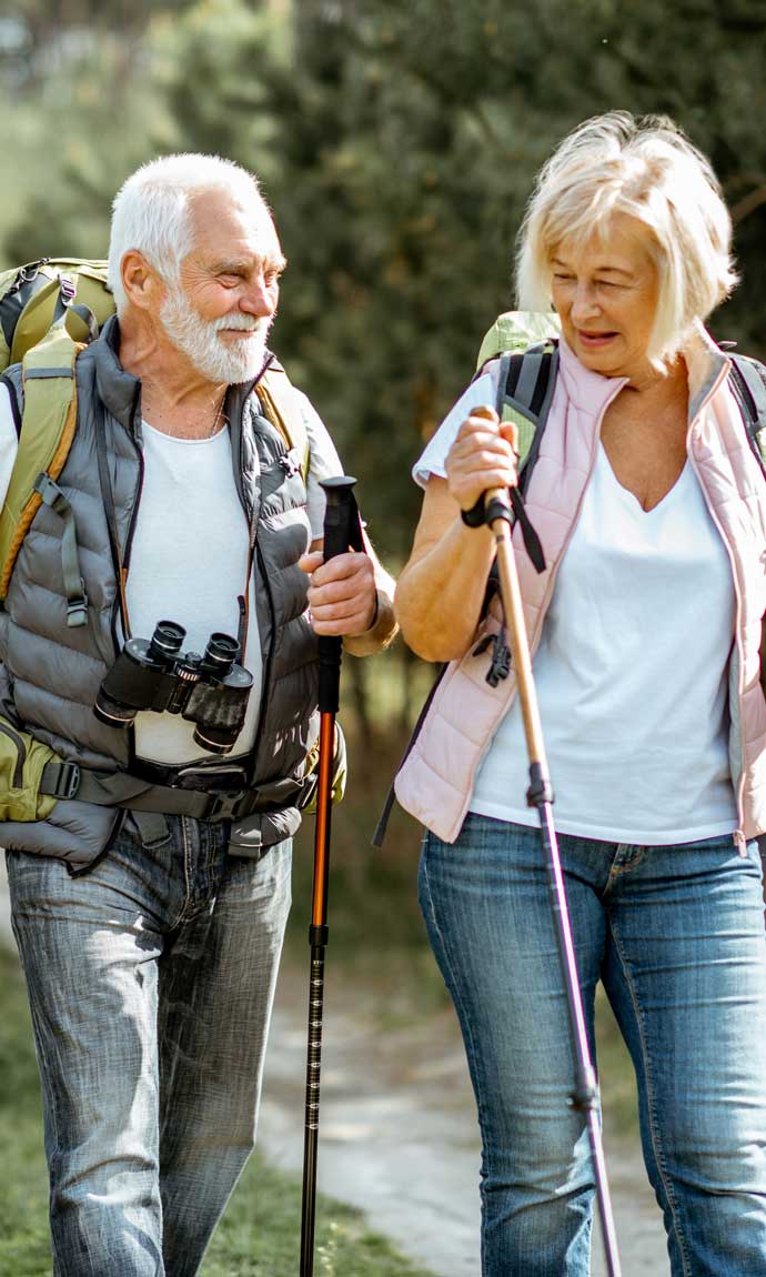 senior couple having an outdoor easy hike