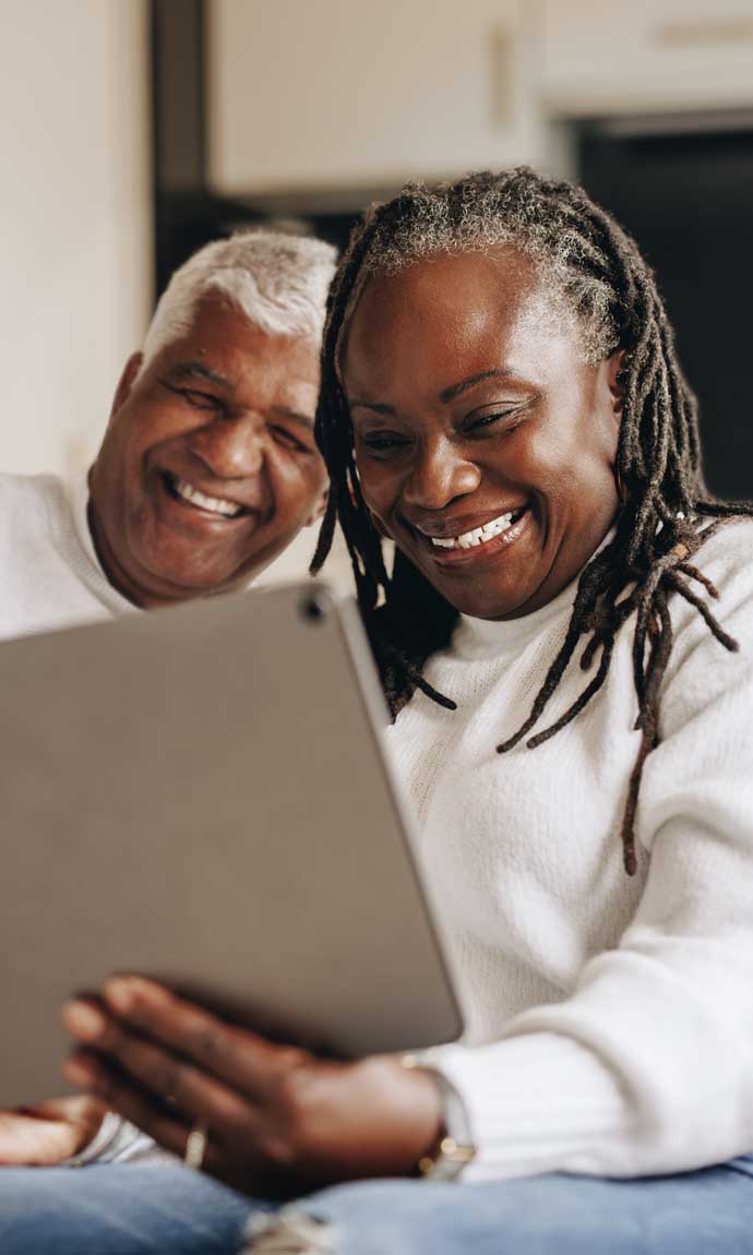 senior couple pleased by reducing hassles for their tax preparation