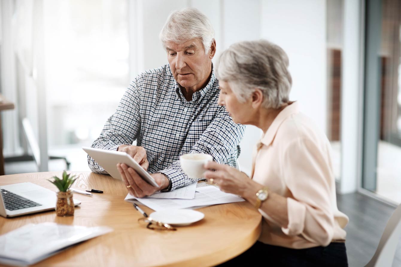 senior couple comparing their home care options