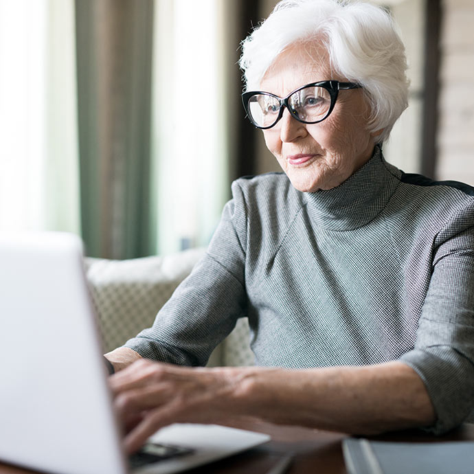 senior woman working on computer